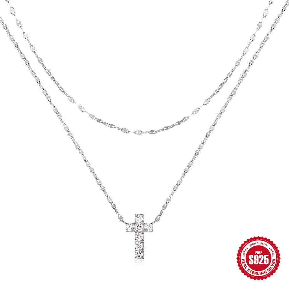 S925 sterling silver double layer twin diamond cross pendant necklace on a clavicle chain in gold or white gold finish.