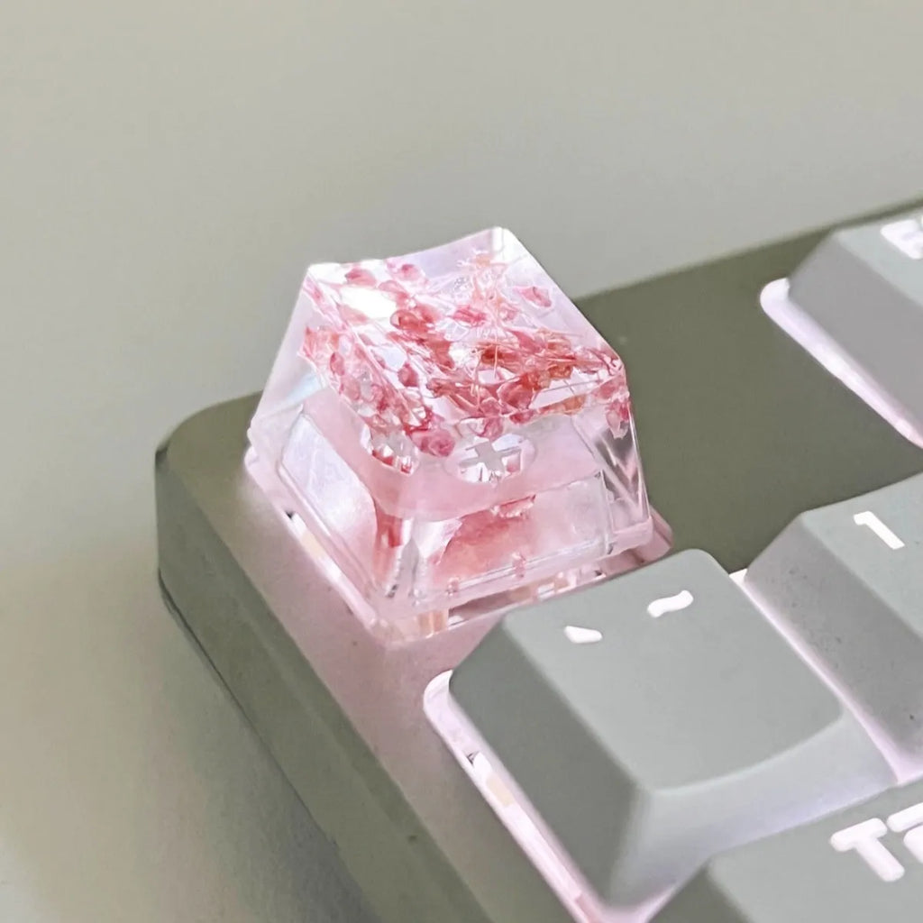High-transparency starry sky design resin artisan keycap for mechanical keyboards, shown in green colour.