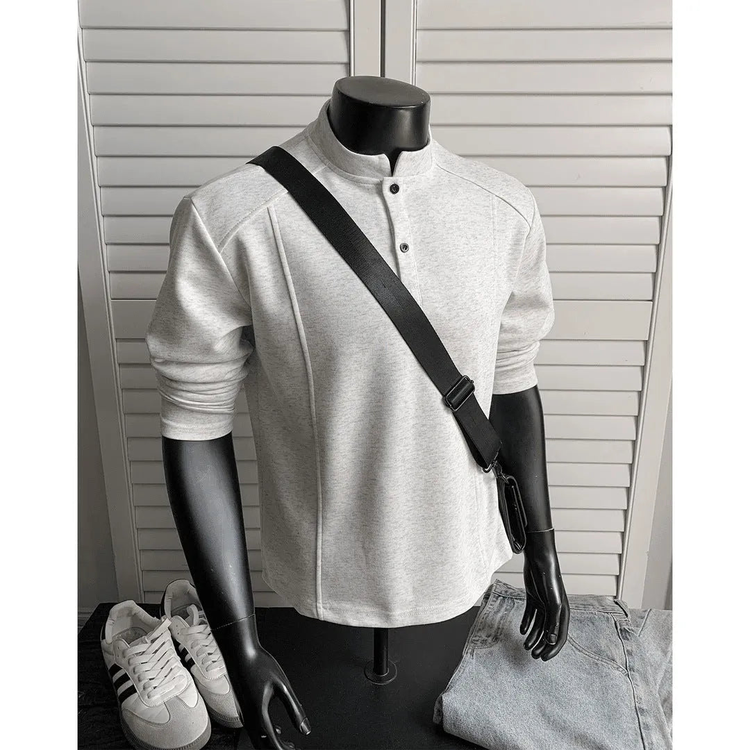 Men's grey asymmetric stand-up collar long sleeve polo shirt on a hanger.