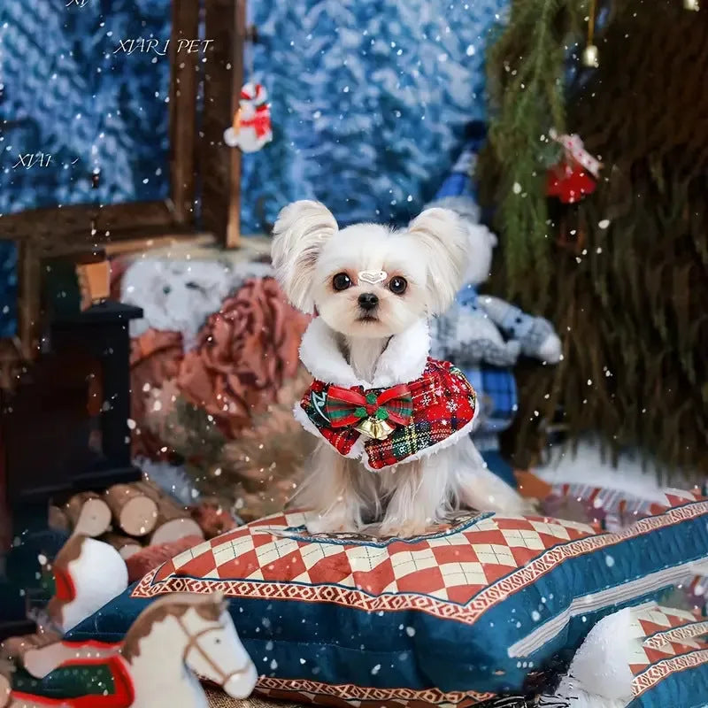 Red background pet Christmas cloak with bell design, shown on a dog, with adjustable scarf length.