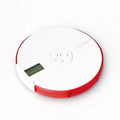 Blue 7-compartment alarm clock pill dispenser showing time display and pill storage