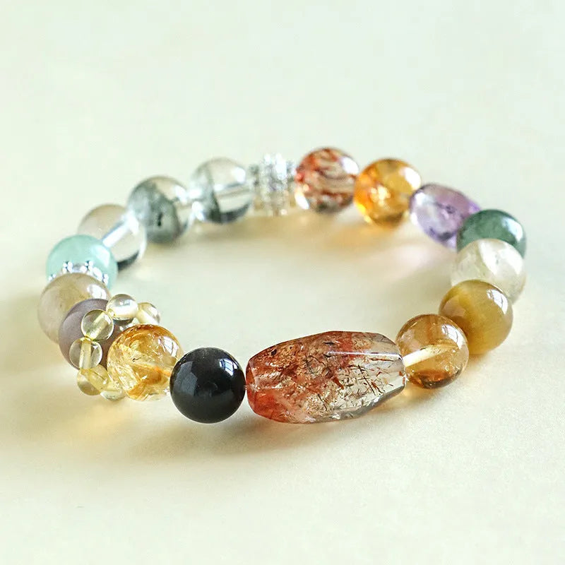 A women's bracelet featuring strands of natural Duobao crystal beads in a black and gold style.