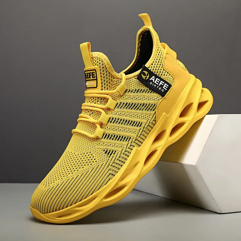 Men's mesh running shoes in black colour with lace-up front and low-top design