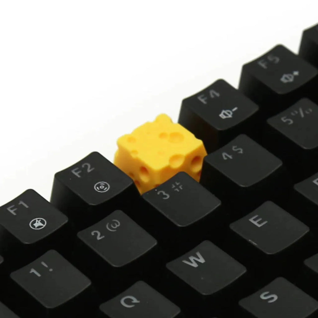 Yellow solid resin custom mechanical keyboard keycap with detailed cheese design