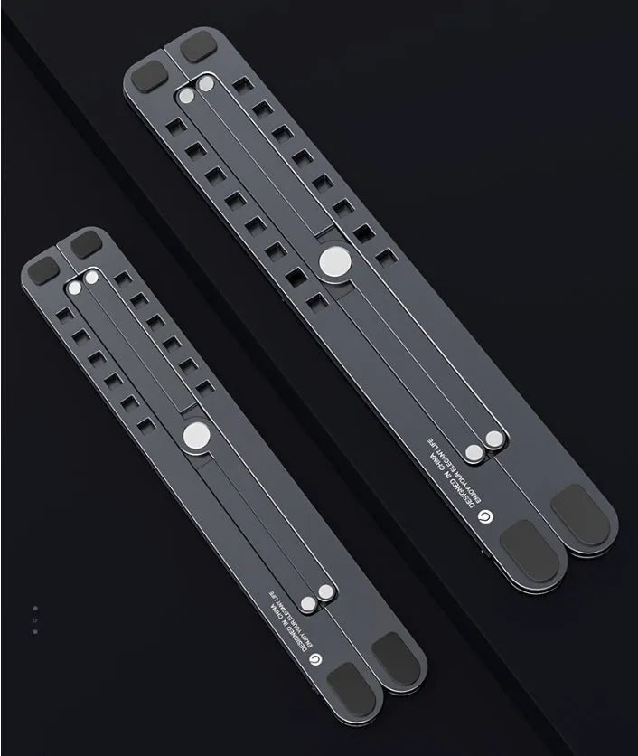 Silver aluminium laptop stand holding a MacBook, shown in both open and folded flat positions.