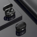 Black stereo Bluetooth headset with bilateral earplug design showing power display.