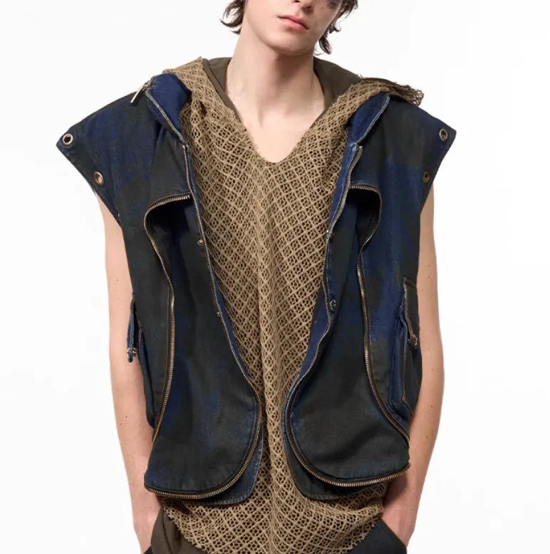 Blue hooded denim vest coat and matching trousers set on a model