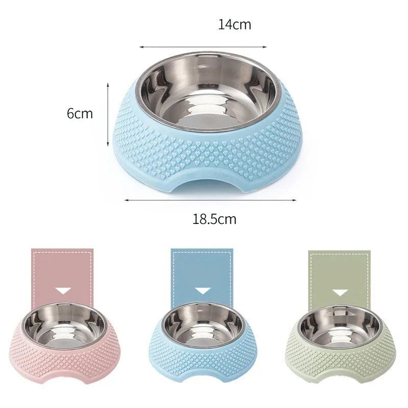 Blue stainless steel pet bowl with a non-slip weighted base on a floor.