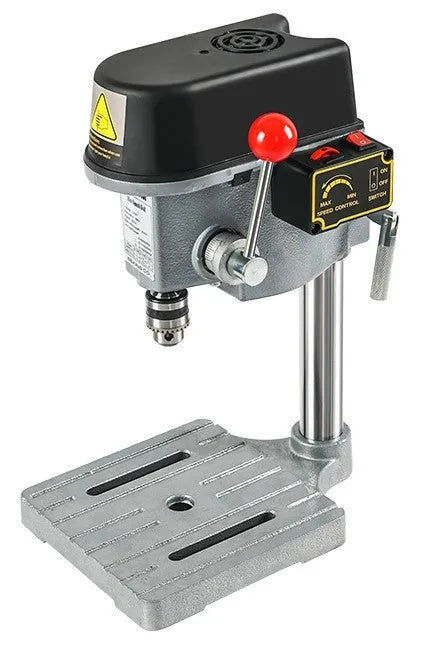 Bench-mounted drilling and milling machine with cross bench pliers and heavy-duty bench pliers.