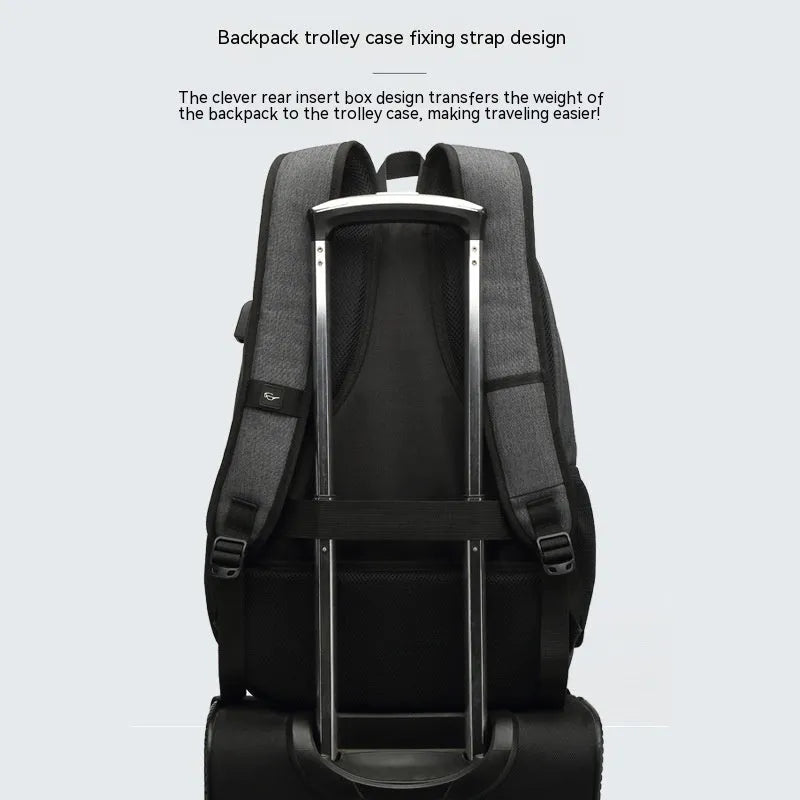 Grey and black USB charging backpack with trolley sleeve on luggage