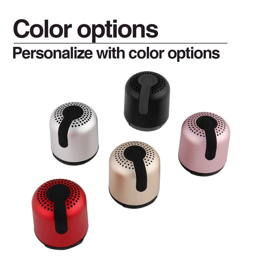 Hieha XQ11 mini cylindrical Bluetooth speaker in metallic finish with control buttons