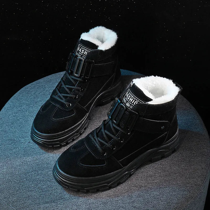 Ladies snow boots in black with artificial PU upper, flat heel, round toe, and front tie laces