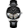 Men's automatic watch with black dial showing tourbillon and moon phase on a steel bracelet.