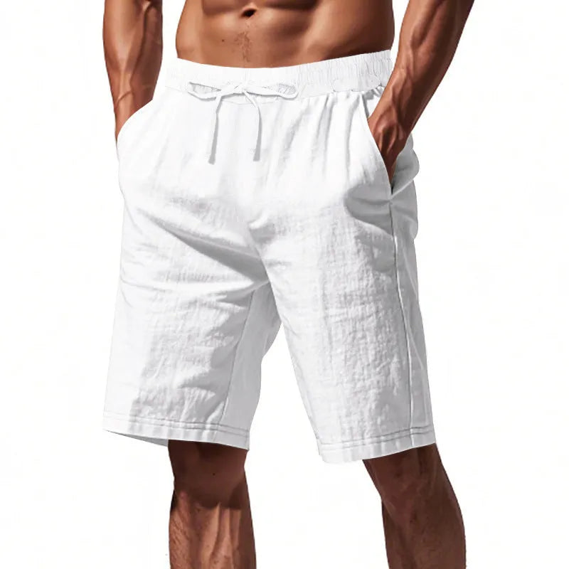 Men's linen beach shorts in solid colour, loose casual straight-leg five length, elasticated waist, summer