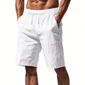 Men's linen beach shorts in solid colour, loose casual straight-leg five length, elasticated waist, summer