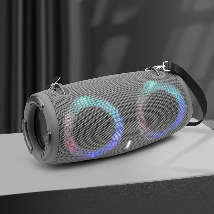 War Drum portable Bluetooth speaker in multiple colours with RGB lights and a carrying strap.