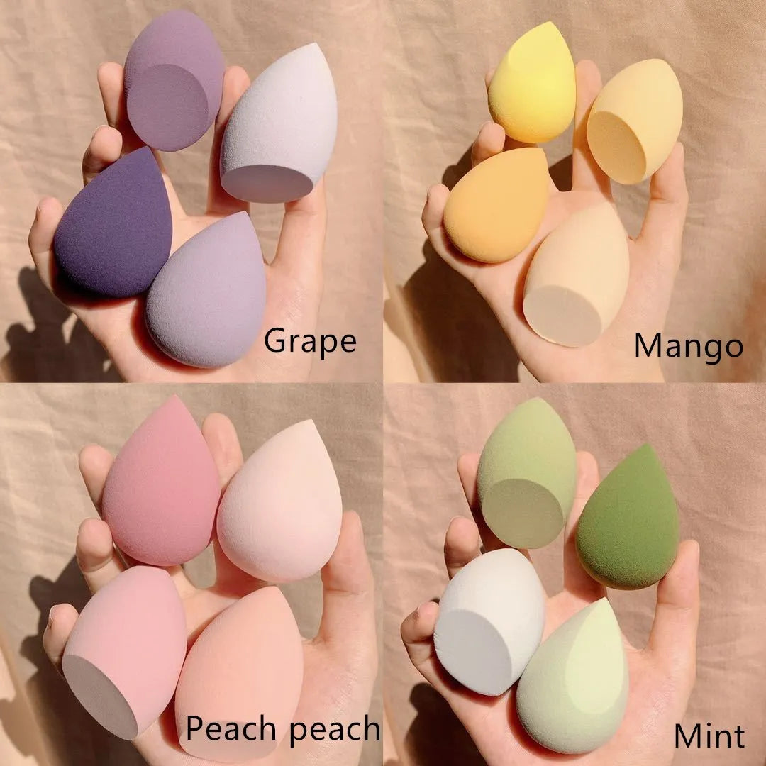 Set of four 6cm makeup blending sponge eggs in grape, mango, mint, and peach peach colours