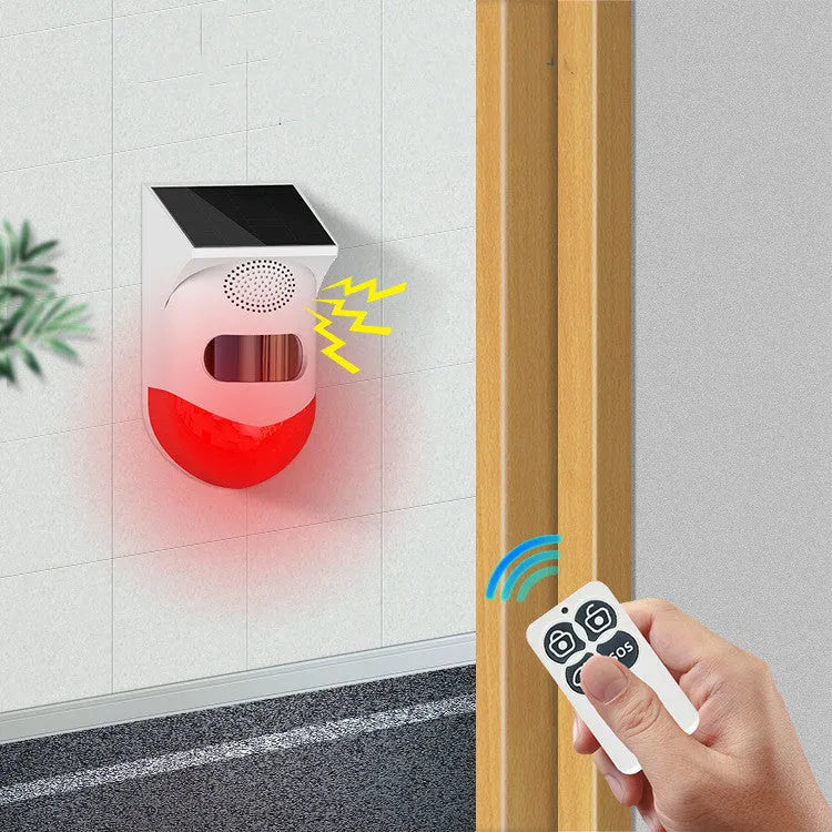 Solar-powered wireless infrared security alarm with remote control for outdoor installation