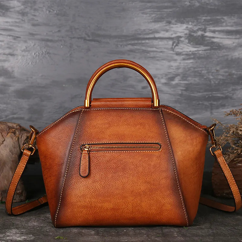 Genuine embossed leather messenger top handle bag in Graphite Grey with totem pattern