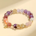 Women's crystal bracelet with lucky snake design and flower beads in amethyst colour