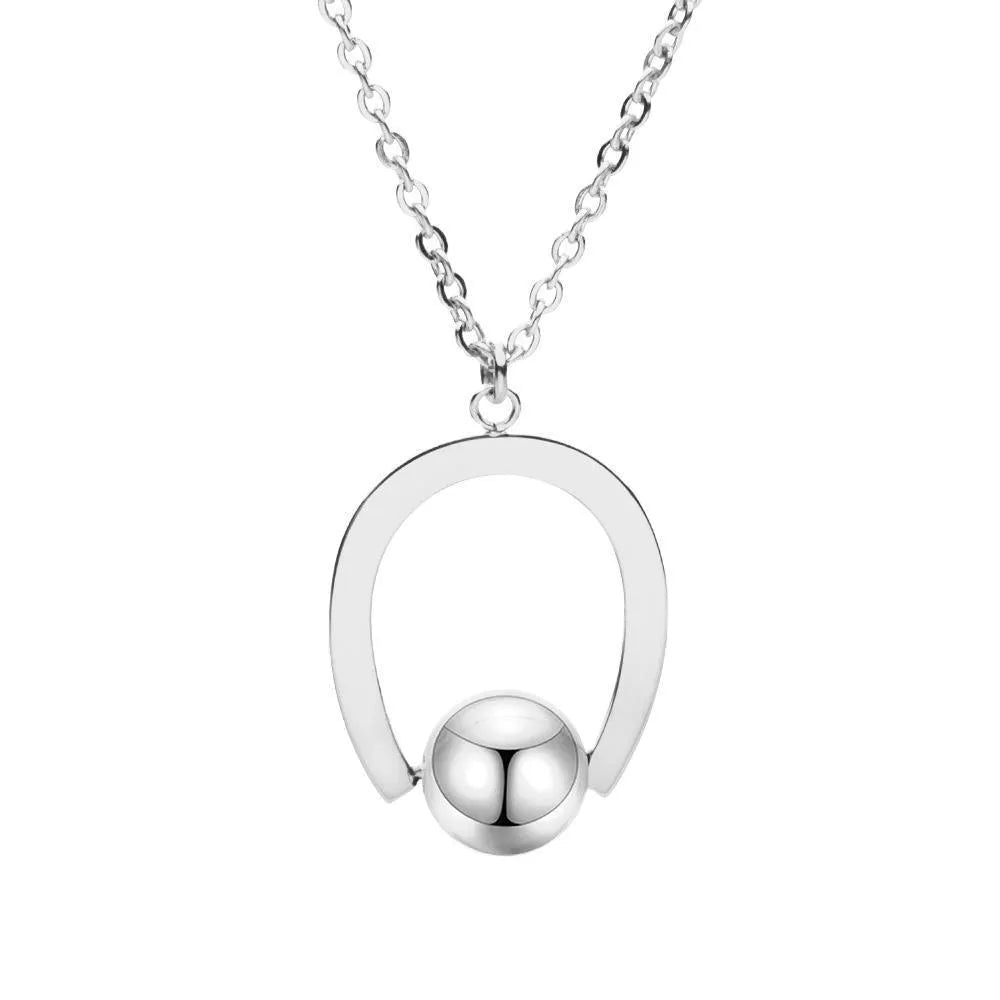Adjustable stainless steel necklace with geometric pendant on a cross chain in gold or silver.