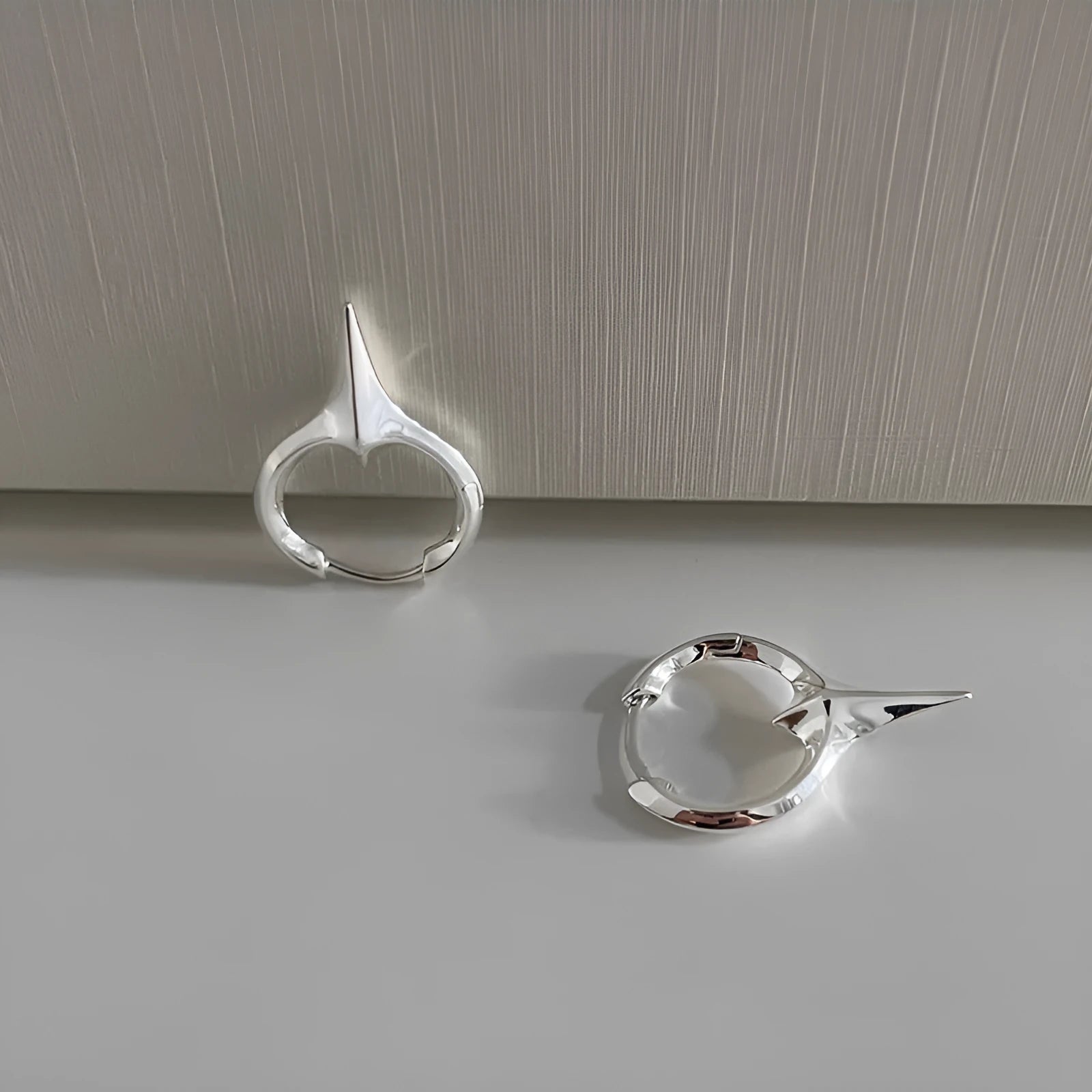 Geometric star shape women's clip-on earrings with electroplated metallic finish