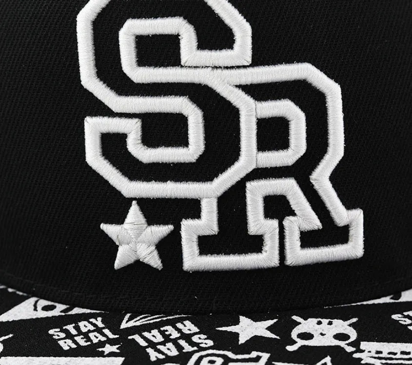 Cotton baseball cap with embroidered lettering on the front, shown in black and white colours