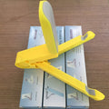 Black foldable tablet holder displaying adjustable angles with phone in landscape mode on non-slip surface