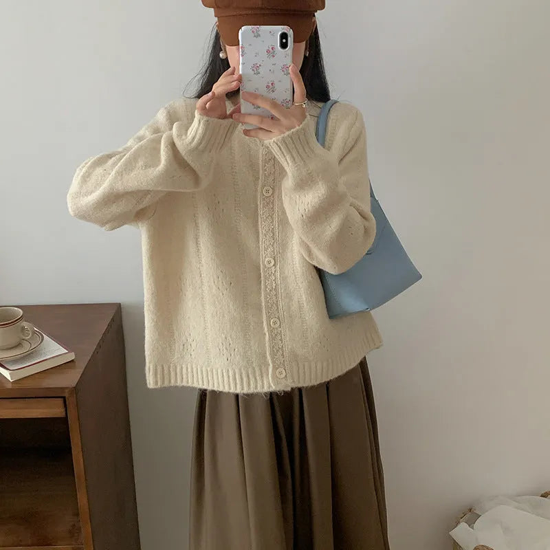 Artistic retro Korean knitwear cardigan coat in loose free size, shown in apricot colour.
