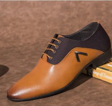 Men's black Oxford-style lace-up shoes with a low upper and rubber sole for business casual wear.