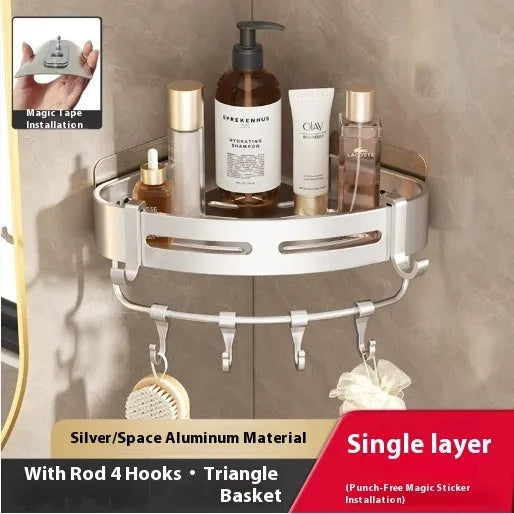 Gun grey metal triangle corner shelf mounted on a bathroom wall for shower storage.