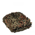 Green camouflage netting set showing different patterns for desert, snow, and woodland use