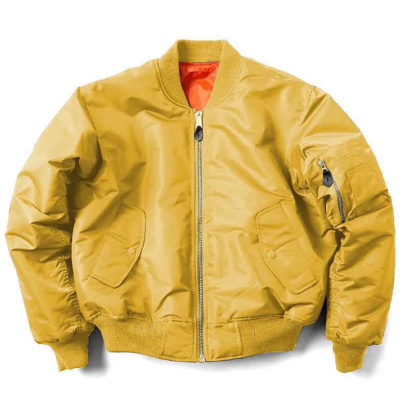 Man wearing a reversible army green nylon pilot jacket, showing the double-sided workwear design.