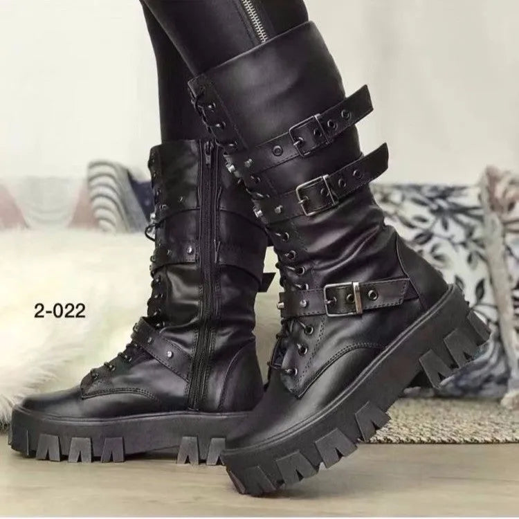 Women's black mid-calf knight boots with large metal buckle and side zip on a white background.