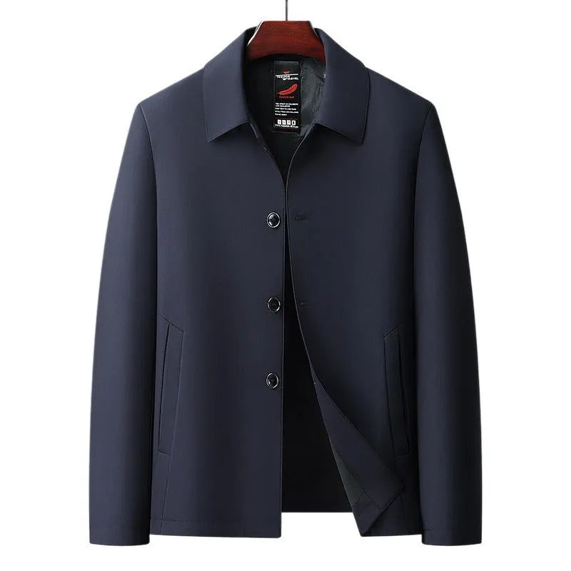 Men's business casual button-down lapel jacket in navy blue, slim fit, wrinkle-resistant, with long sleeves and side pockets.