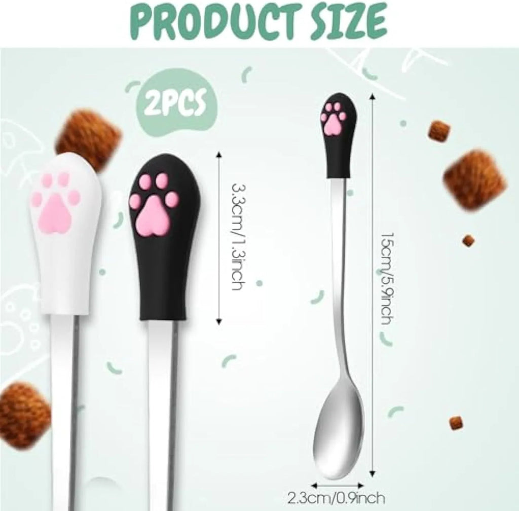 White and black stainless steel pet food spoons with cat paw print and silicone grip