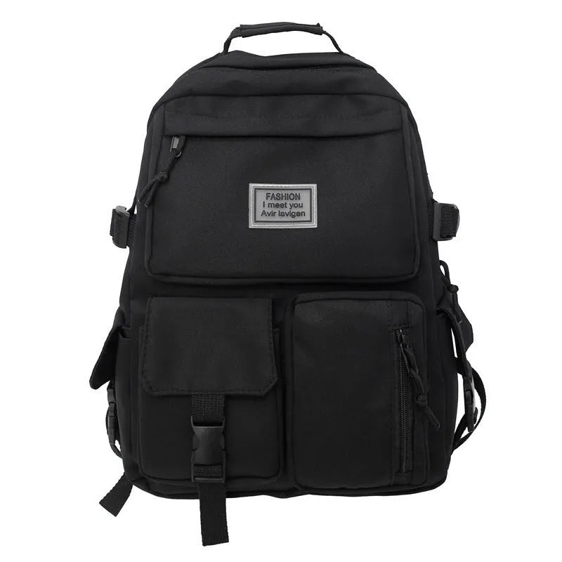 Nylon student backpack in black colour showing laptop compartment and three-dimensional pockets