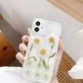White clear epoxy daisy floral design TPU phone case for iPhone, shown from the back.