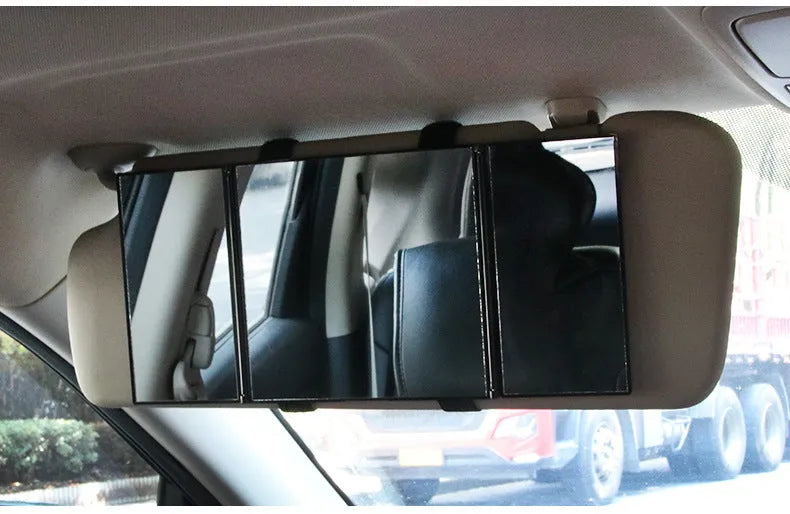 Silver car folding makeup mirror shown both closed and opened positions