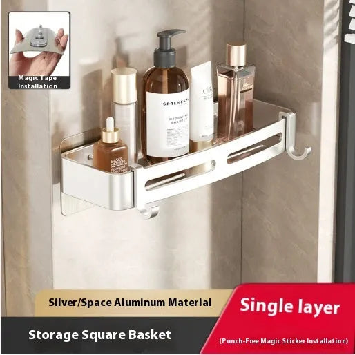 Gun grey metal triangle corner shelf mounted on a bathroom wall for shower storage.