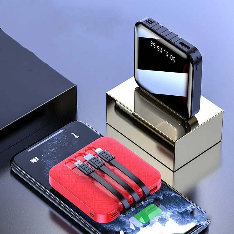 Black or red plastic power bank with an integrated charging cable, showing compact size.