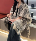 Women's casual polyester tassel scarf cape in a free size shawl style.