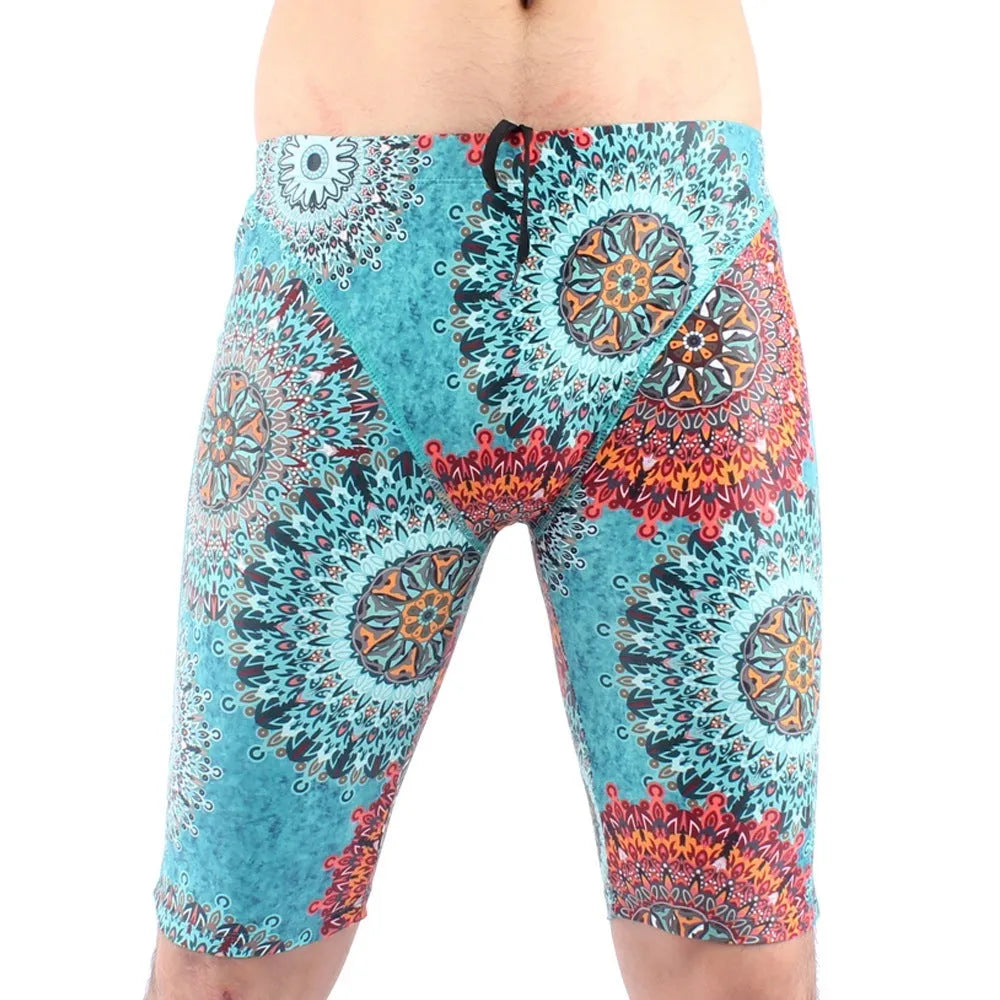 Men's green quick-drying nylon swimming trunks with loose five-point fit on a white background