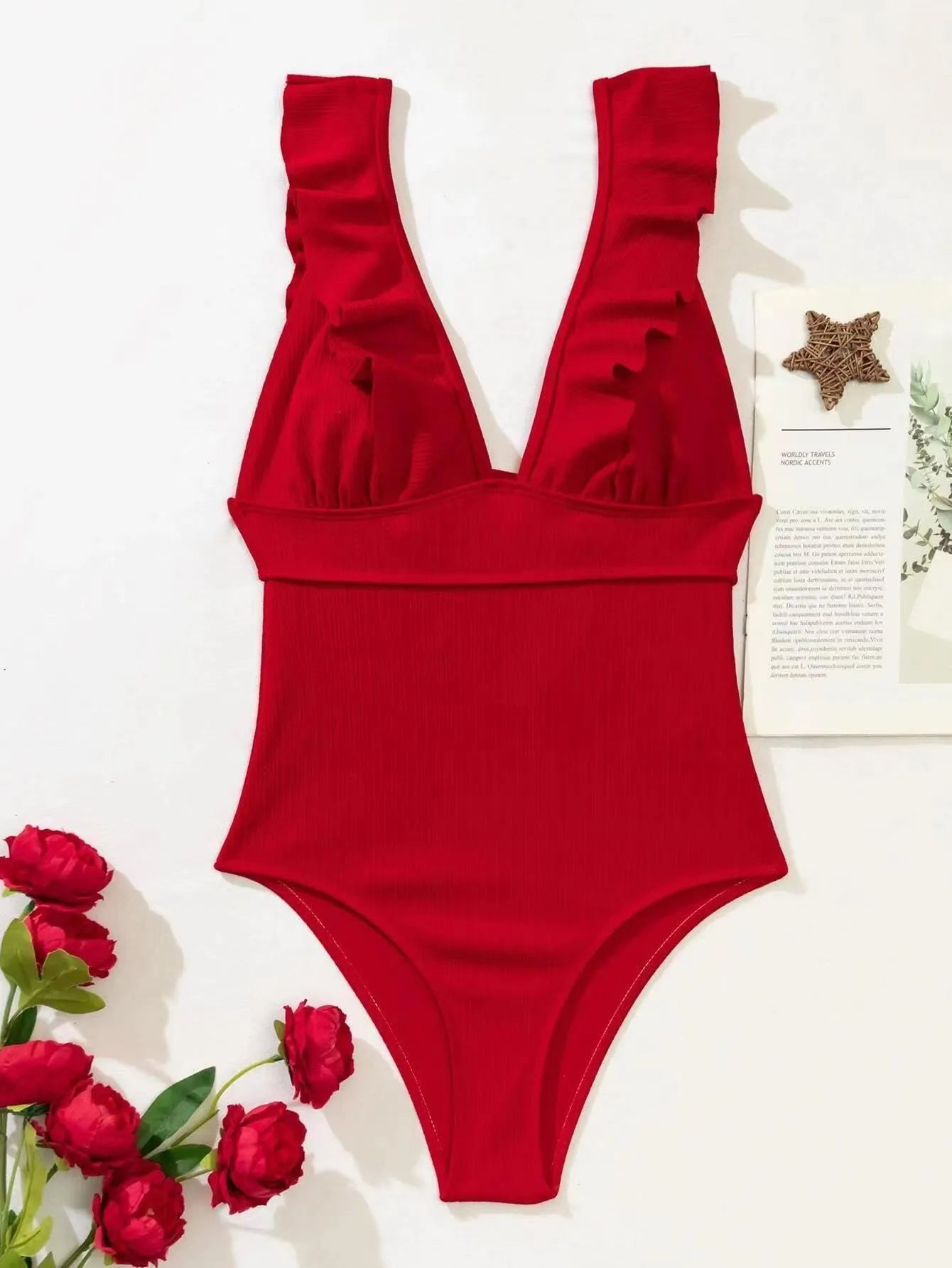 Women's one-piece swimsuit with ruffled shoulders, adjustable straps and back lace design in solid colour