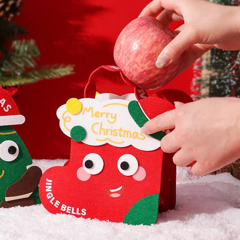 Christmas gift felt bag in green with cartoon design, used for gift packaging