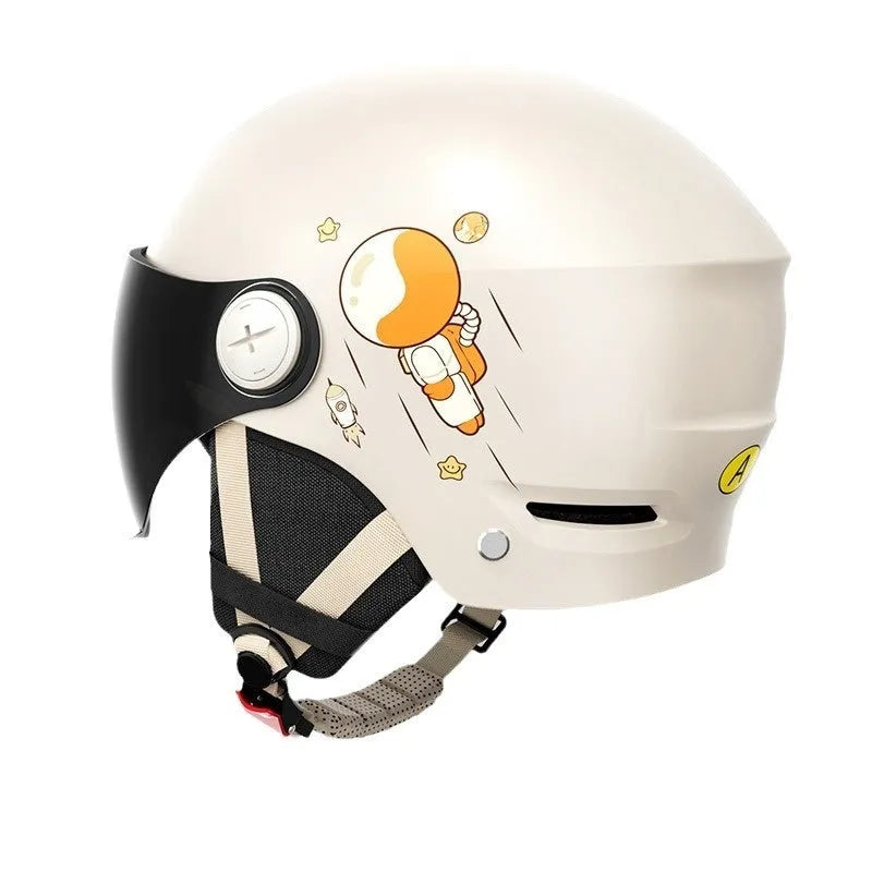 Khaki open-face motorcycle half helmet on a stand, showing the ABS shell and an optional sun protection lens.