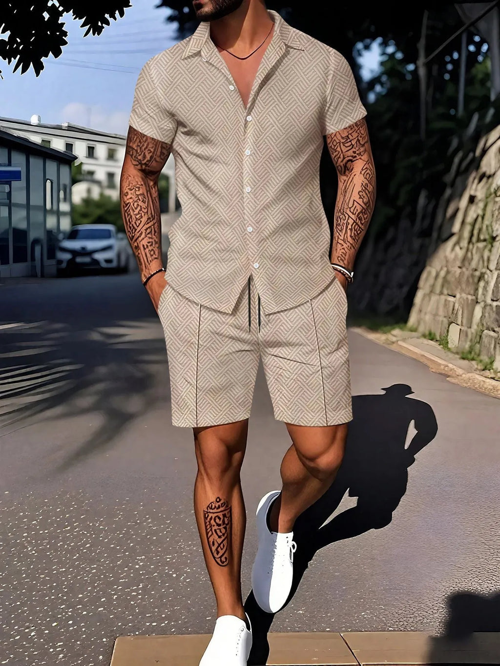 Man wearing a digitally printed short sleeve casual suit set in a neutral colour.