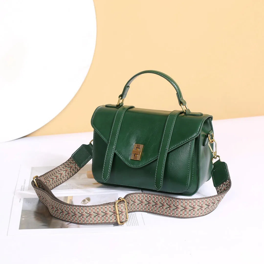 Full-grain vegetable-tanned cowhide tote bag in horizontal rectangular shape with double shoulder straps, large capacity interior, available in five colours