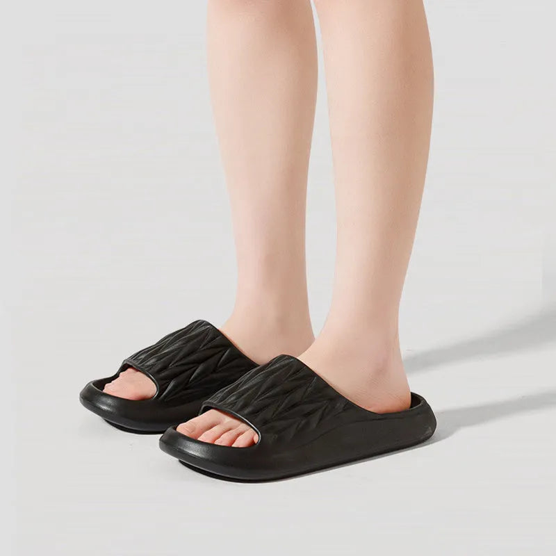 Leaf texture design EVA slippers for men and women in various colours on a non-slip sole.