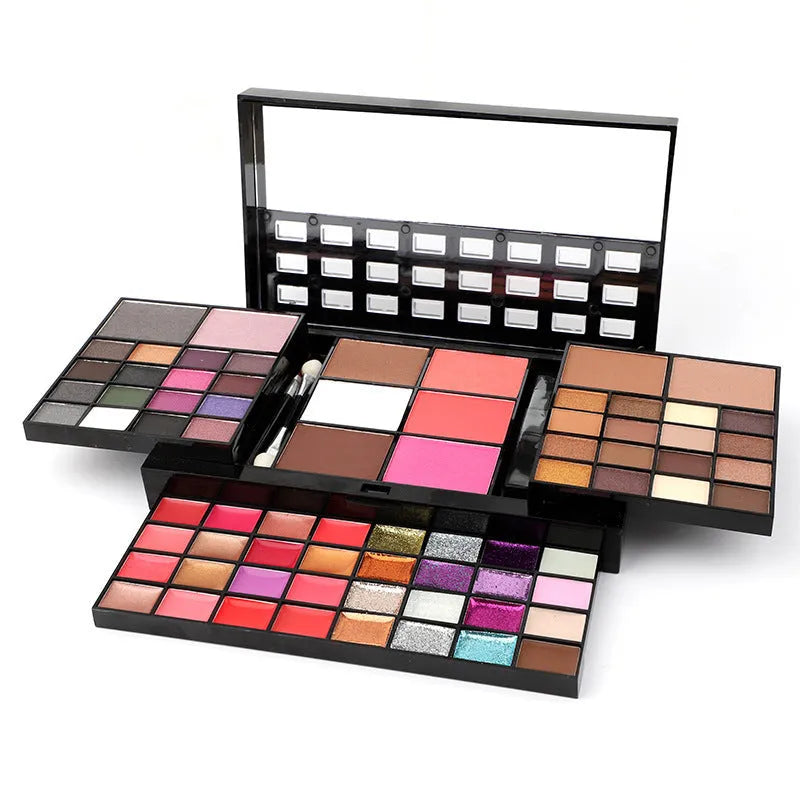 Four-layer 74 colour makeup palette with eyeshadow, lip gloss, and brushes in a plastic case.